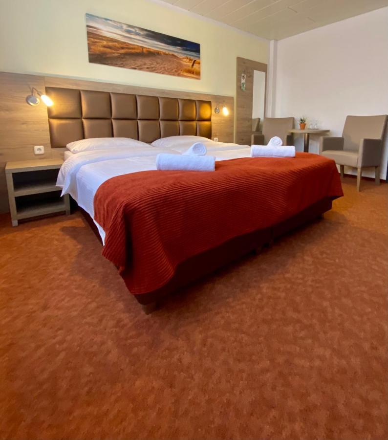 Strand Hotel Nordsee, Hotel Deichlaeufer Tossens Luaran gambar